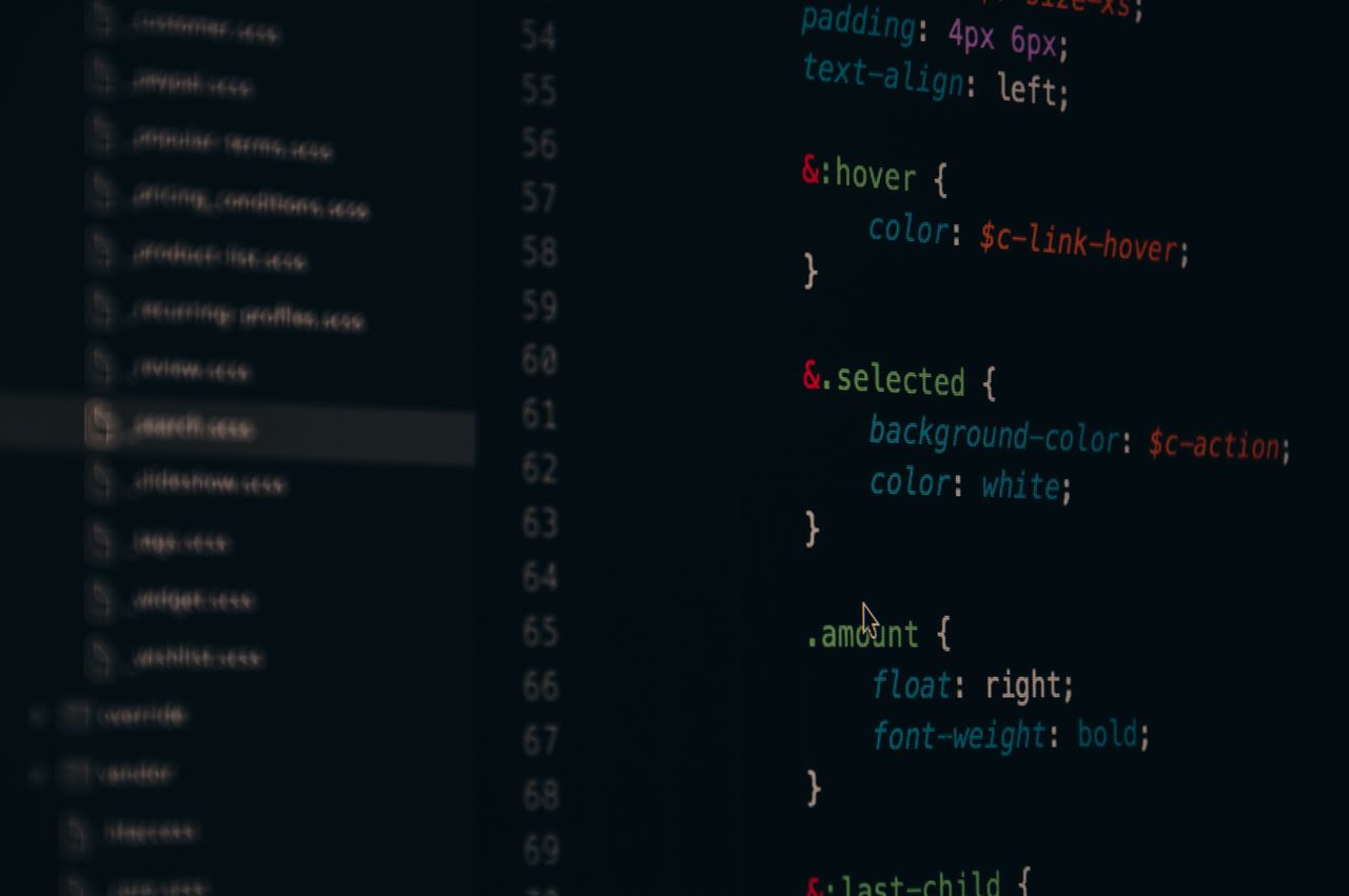 services-04 Close-up of colorful CSS code lines on a computer screen for web development.